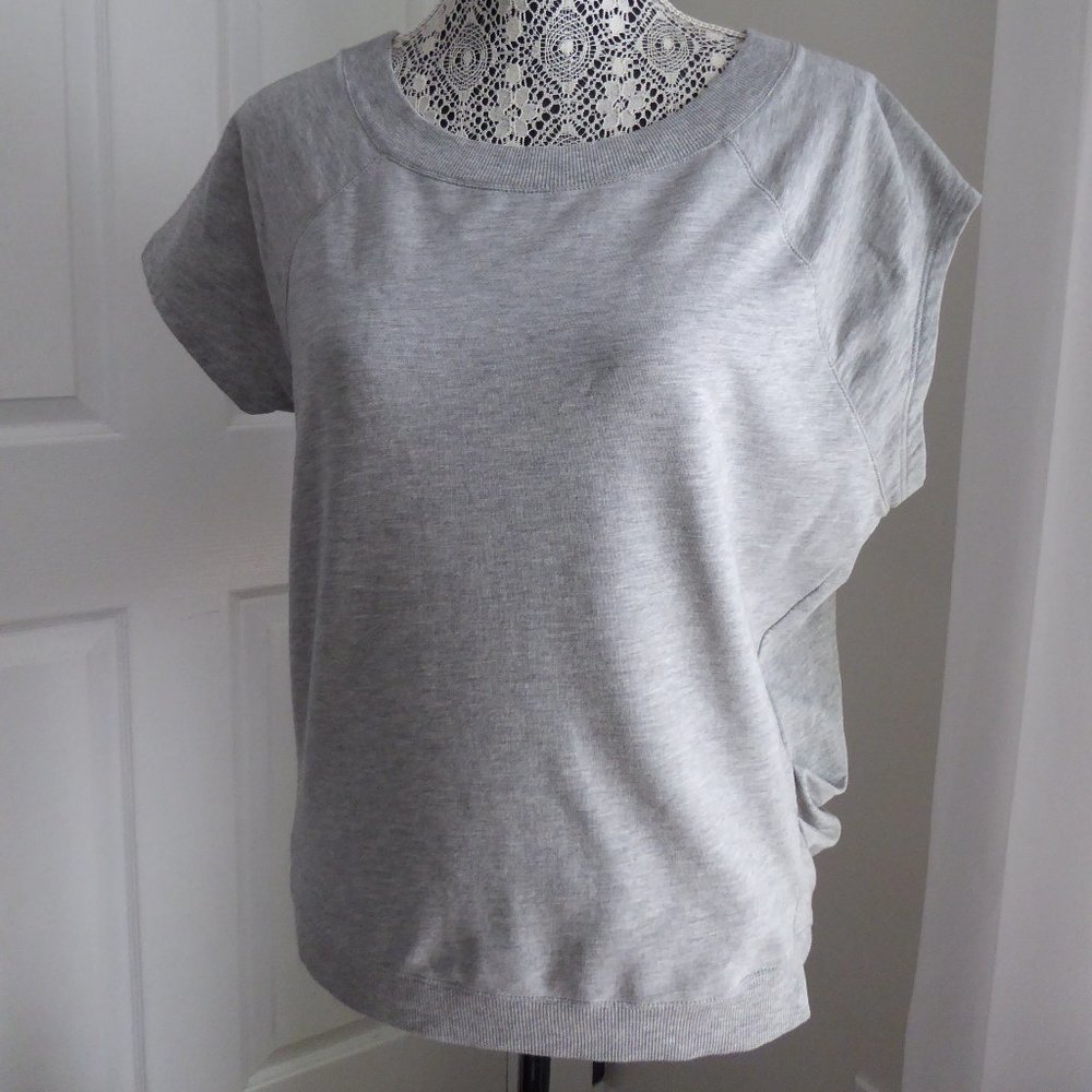 Asymmetrical sleeve top